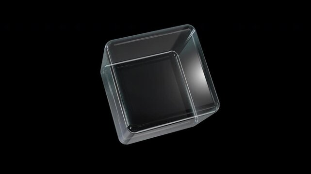 Clear glass 3d cube rotating isolated on black background looping animation.