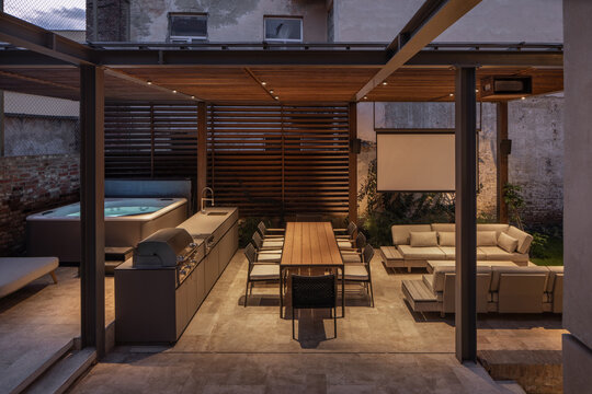 Outdoor dining and lounge under pergola