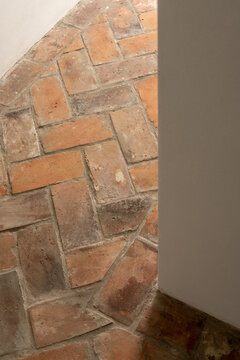 Close-up of terracotta brick tile flooring texture
