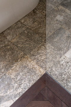 Marble floor detail with geometric transition