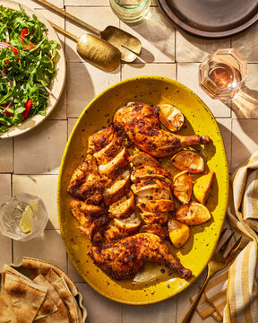 Rustic Roast Chicken Dinner With Potatoes and Fresh Salad