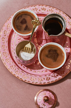 Traditional Turkish coffee served in arabic style pots and cups