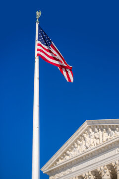 Supreme Court institution of federal judicial branch. Supreme Court landmark of American democracy. Supreme Court building in Washington DC. Supreme Court facade of legal authority.