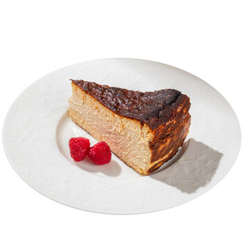 Basque burnt cheesecake with fresh raspberries