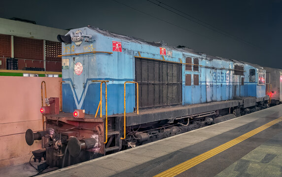 Old WDS-6 diesel locomotive of Indian Railways performing night shunting duty at Chennai railway station, Tamil Nadu, India