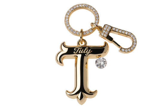 Gold letter tuly keychain luxury accessory with diamond isolated on a transparent background