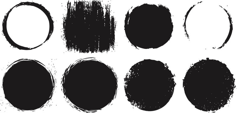 Set of assorted black grunge round shapes and brush strokes on white background