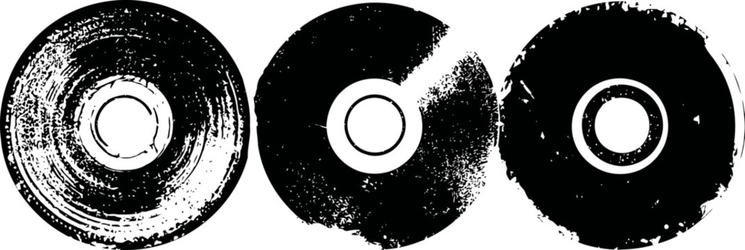 three textured vinyl records with worn, scratched surfaces isolated on white background