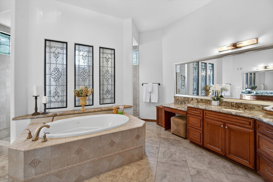 Spacious bathroom with soaking tub and double vanity