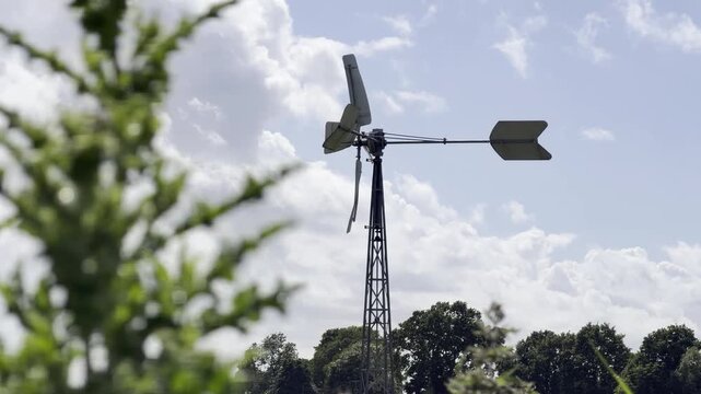 Turning steel wind turbine in detail