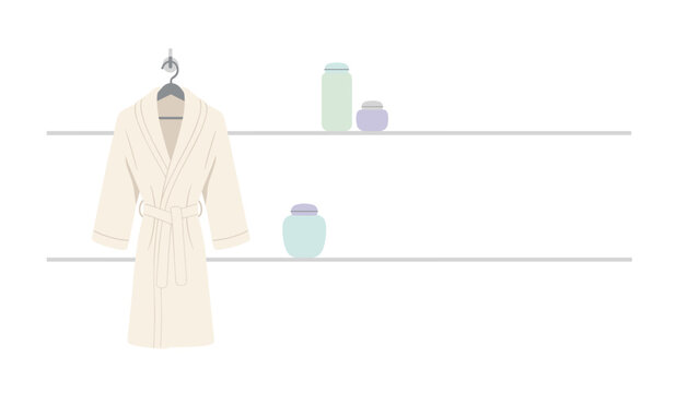 White bathrobe hanging on wall hook next to shelves with skincare jars for spa interior decor, hotel bathroom amenities, and wellness lifestyle concepts.
