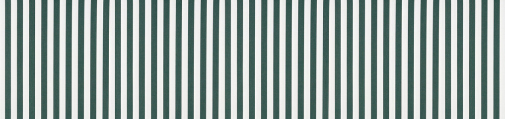 Seamless pattern of vertical dark green and white textile stripes on textured awning canvas fabric...
