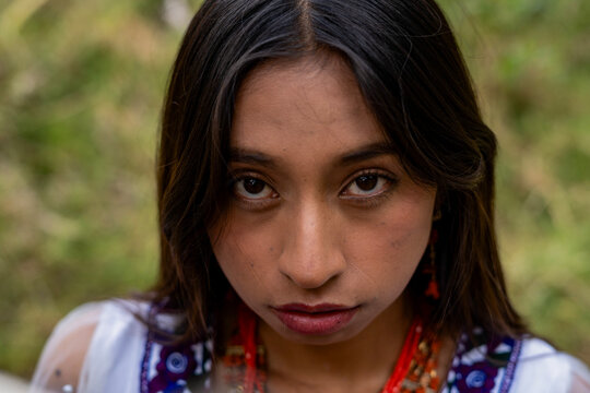 Indigenous young woman looking with intense gaze