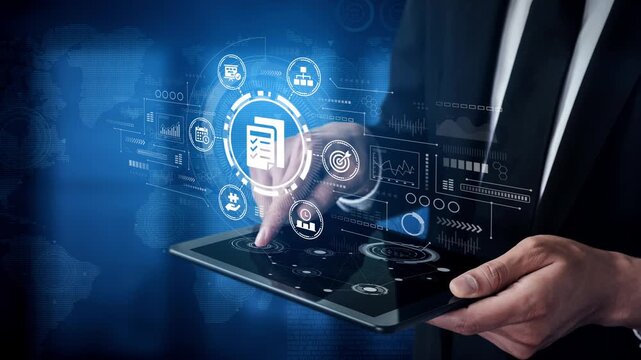Business Professional Using Tablet with Data Analysis and Digital Graphs in a Modern Corporate Environment. Entropy.