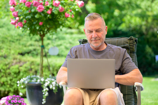 Senior Man Outdoor Laptop Working