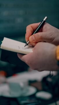 Business calendar notebook open paper planner desk corporate setting top view. Close up overhead shot reveals a minimalist work desk layout with blank agenda schedule pages ready for planning
