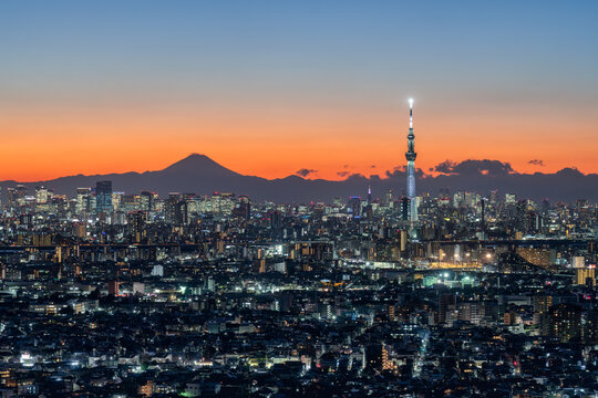 Tokyo Skyline at night with view of Mount Fuji and Tokyo Skytree, Japan