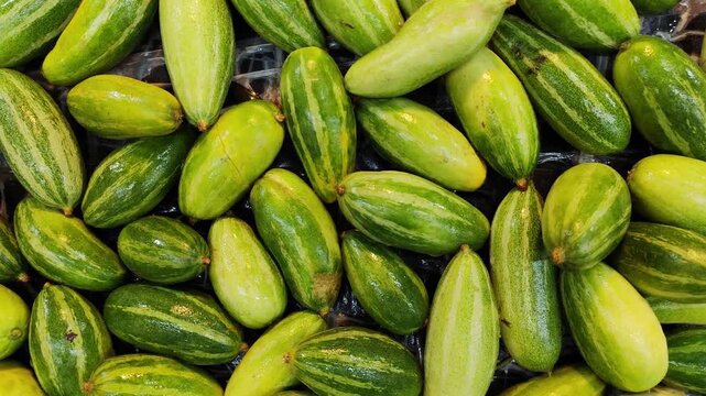Fresh Pointed Gourd Vegetables Displayed Together at a Local Market