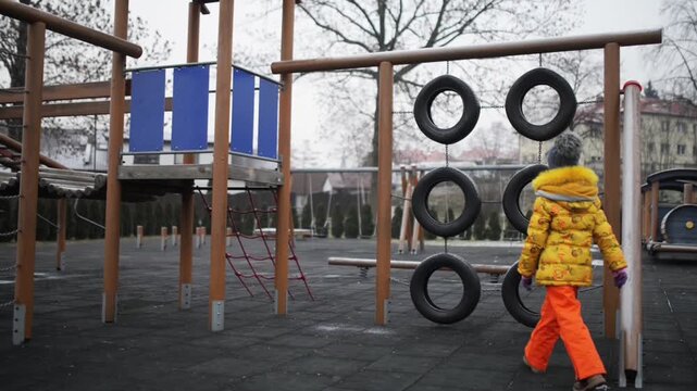 little girl playing on playground