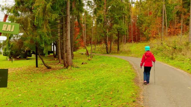 Little beautiful girl walks in Slovak Paradise, is mountain range in eastern Slovakia. It is part of Spis-Gemer Karst, Slovak Ore Mountains, Western Carpathians.