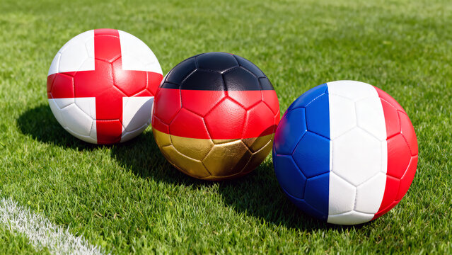 3 ballons de football aux couleurs anglaise, allemande et fran&ccedil;aise 