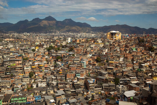 High angle view of the densely populated favela Complexo do Alem&atilde;o with brick houses spreading across the hillsides of Rio de Janeiro