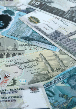 Egyptian pound money banknotes pile on table. Egypt bills of EGP currency. Concept of economy