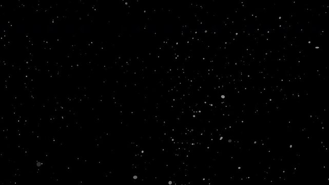 Organic Dust Particles Floating in Air with Slow Motion on Black Background