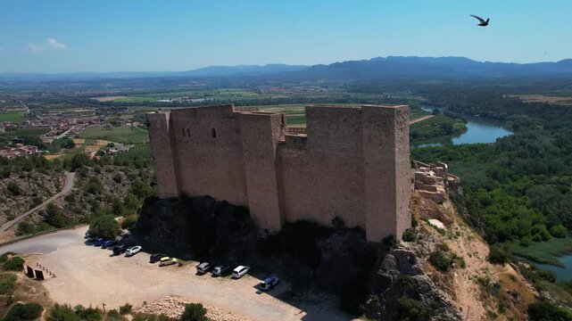 Panoramic drone shot of Miravet's castle, Spain. Old Templars' castle shot from above
