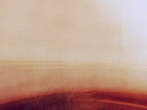 Abstract landscape blur background, intentional camera movement icm with warm sand and terracotta tones, soft horizon line minimalist painting style texture