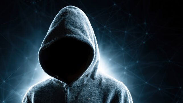 Anonymous hacker in a hoodie with glowing network background representing cybercrime