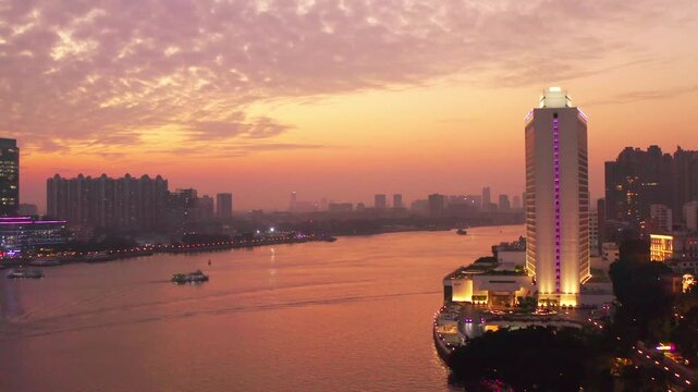 Bangkok Skyline at Sunset over the Chao Phraya River in Bangkok, Thailand