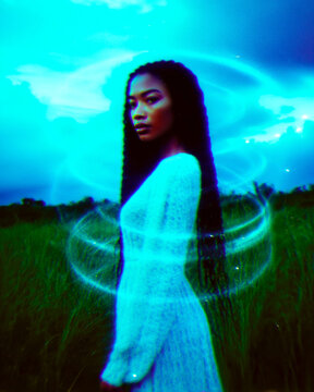 Liminal Aesthetic Southern Gothic Black Woman Standing Outdoors in Green Meadow