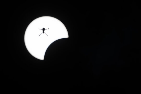 Drone Silhouette Against Partial Solar Eclipse in WV