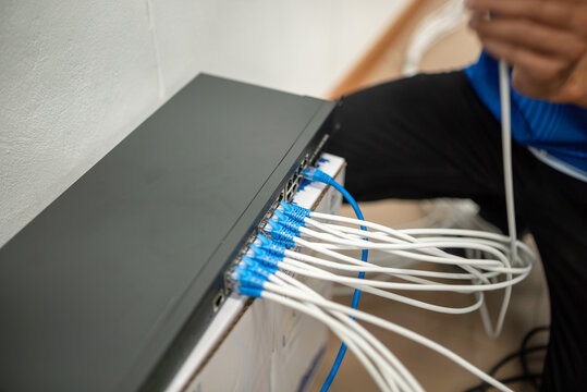Network Technician Installing Ethernet Cables