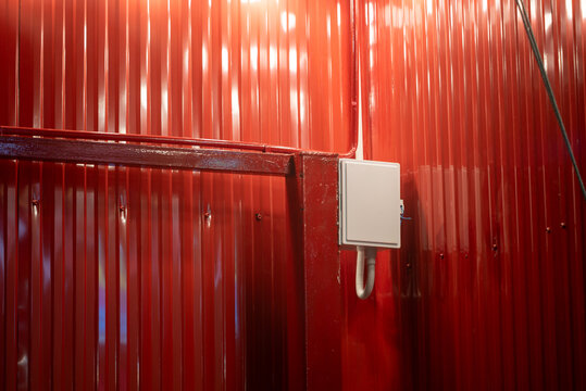 Red Metal Wall with Electrical Box and Frame