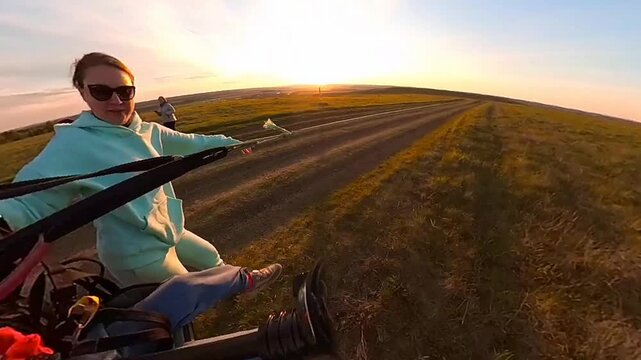 Children flight on tandem paraglide