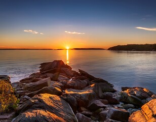 Obraz premium dawn on the rocks st lawrence river quebec canada