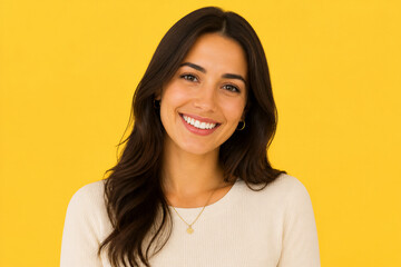 Fototapeta premium Smiling woman facing camera against yellow background