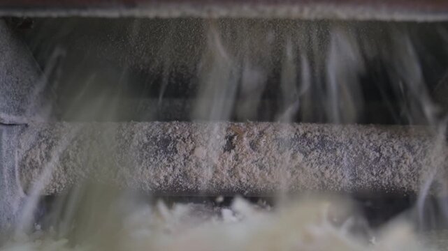 Timber going through a thickness planer