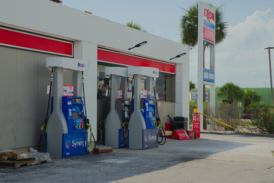 Exxon Gas Station Under Construction With Dirt Piles and Broken Pavement Outside Convenience Store Editorial Use Only St. Pete Beach, FL USA June 10, 2026. rusted pipe, conveying repair work, urban ma
