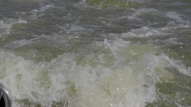 Boat Wake Churns Water on High Rock Lake