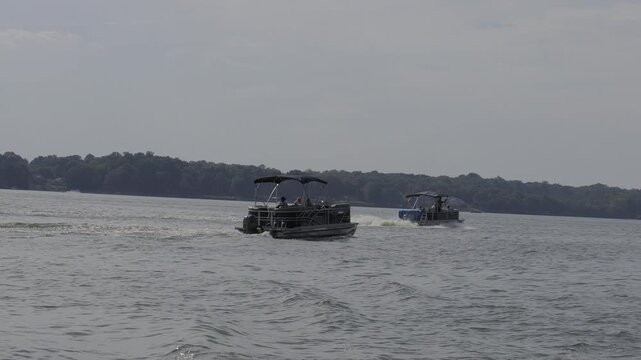 Pontoon Boats Cruise Across High Rock Lake