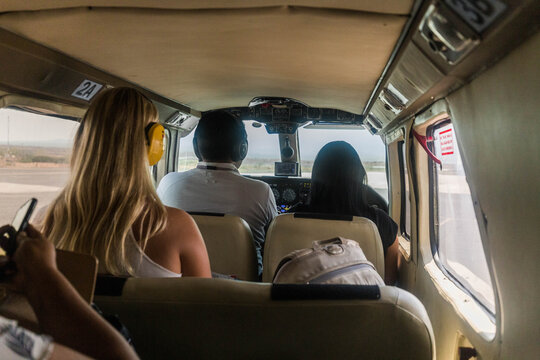 girl in a small plane