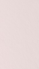 Naklejka premium Soft pink textured mobile wallpaper with a subtle, paper-like finish.