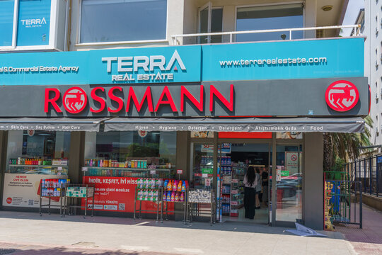 Rossmann cosmetics and beauty care store facade in Turkey with colorful product displays and signage in a commercial area during daylight hours