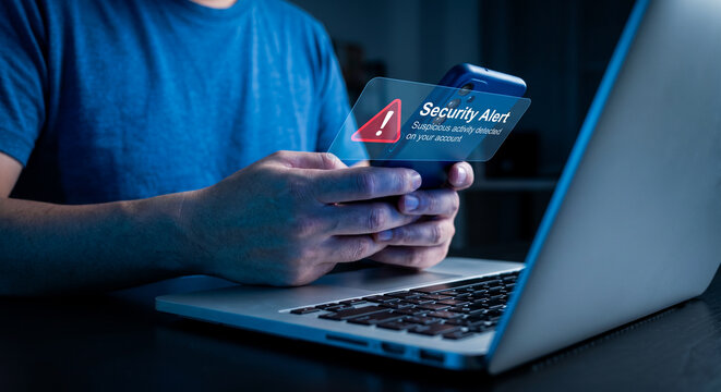 Man holding credit card and using laptop, online shopping security, cyber safety, e-commerce
