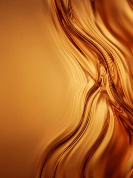 Luxurious abstract background of flowing molten gold with smooth metallic ripples and warm amber lighting