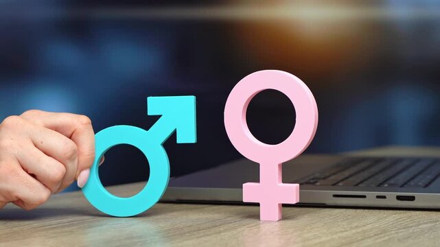 Women holds male and female gender symbols. Target audiences and marketing strategy. Gender equality in business and the workplace supports inclusive branding.