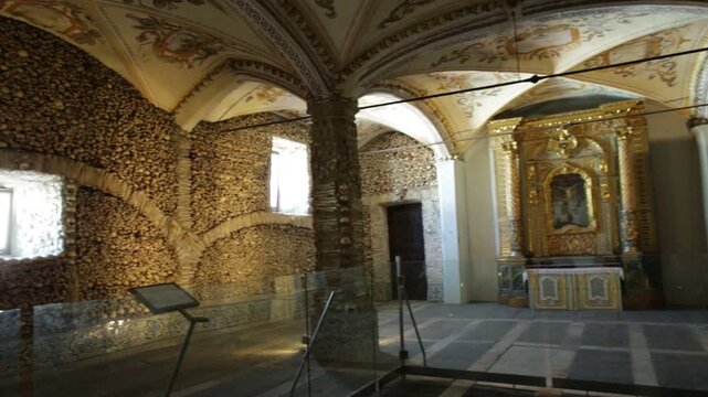 Evora, Portugal - August 18, 2017: Panorama of Chapel of Bones or Capela dos Ossos, one of the most visited monuments of Evora, Portugal. It is an internal chapel next to the Church of San Francesco.